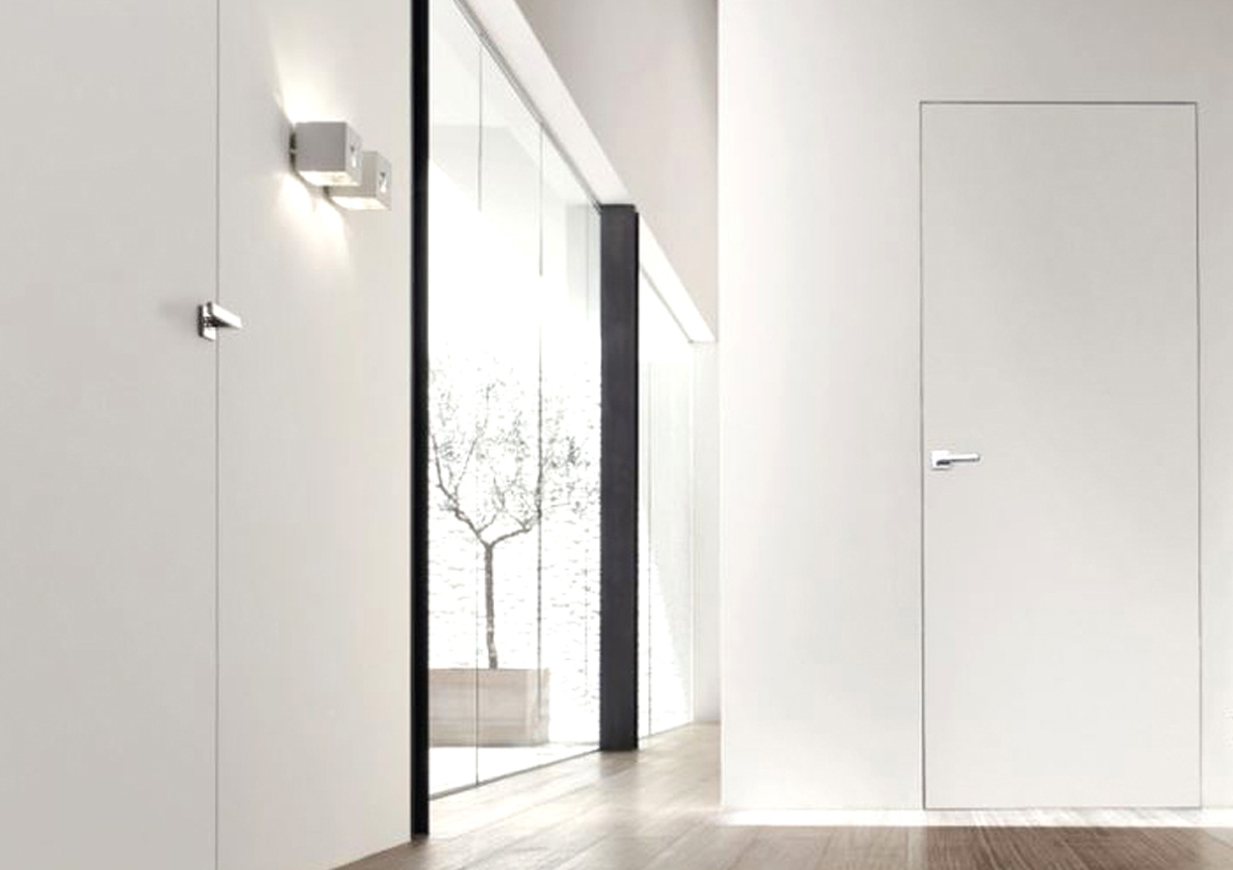 PORTE RASO MURO<br>Soluzioni ad alto livello per chi ama la perfezione
